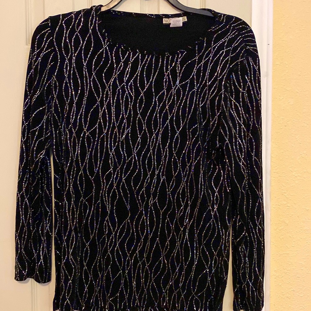The silver long sleeve shirt